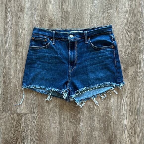 Levi's High Rise Raw Hem Denim Shorts Size 32 Medium Wash Summer Cutoffs - Picture 1 of 4